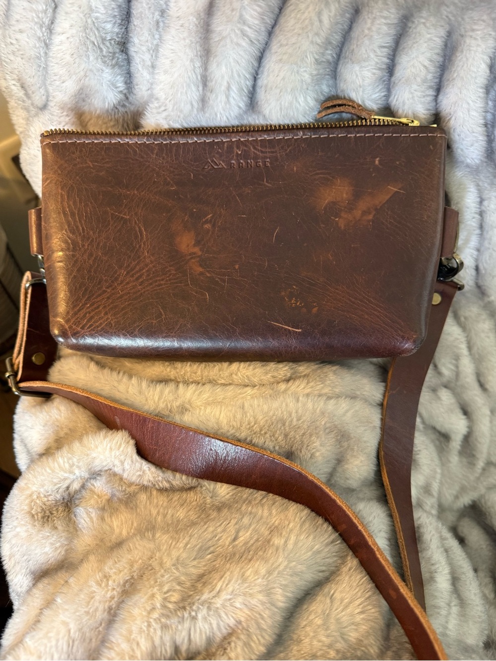 Range Leather. Brown Leather Crossbody Bag with Adjustable Strap and Zip Closure